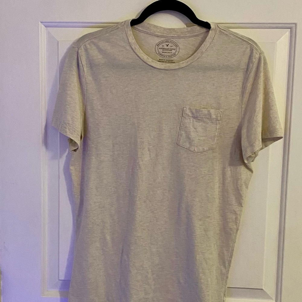 American Eagle Outfitters Light Tan Short Sleeve front pocket Tee